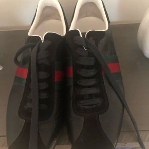 Women’s Gucci leather and suede sneaker.